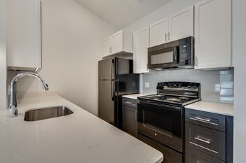 Elm Black Appliances at Uptown Square Apartments, Michigan